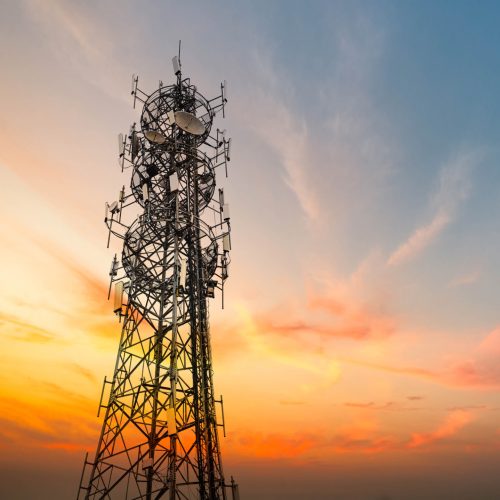 5G Sunset Cell Tower: Cellular communications tower for mobile phone and video data transmission